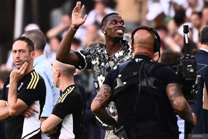 Gelandang Juventus Paul Pogba. (Photo by Marco BERTORELLO / AFP) 