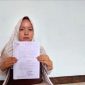 Anggie Ratna Fury Putri, guru honorer SD di Kabupaten Langkat dipecat oknum kepala sekolah diduga karena suarakan kecurangan seleksi PPPK. Foto: LBH Medan