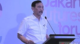 enteri Koordinator Bidang Maritim dan Investasi Luhut Binsar Pandjaitan dalam acara 