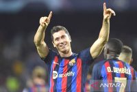 Barcelona menelan kekalahan dari Girona pada pekan ke-34 La Liga Spanyol. Hasil ini membuat Real Madrid memastikan diri sebagai juara La Liga 2023/2024. Foto: Antara/AFP