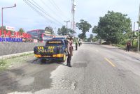 Personel Satlantas Polres Simalungun melakukan patroli di salah satu titik rawan macet saat akhir pekan. Foto: Humas Polres Simalungun