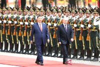 Presiden Xi Jinping dan Presiden Vladimir Putin bertemu di Beijing, China pada Kamis (16/5/2024). Foto: Antara/HO-Kementerian Luar Negeri RRC