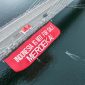 Spanduk Bertuliskan Indonesia Not For Sale di Jembatan Pulau Balang. Foto: Greenpeace