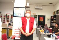 FM, Analis Kredit bank pelat merah yang ditahan Kejati Sumut terkait dugaan korupsi pemberian fasilitas kredit yang merugikan negara. Foto: Humas Kejati Sumut