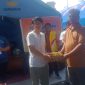 Tim pasangan ROMANTIS saat menyerahkan bantuan kepada korban kebakaran di Pasar Belakang, Kota Sibolga. Foto: Topikseru.com/ Hendra Simanjuntak