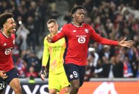 Pemain Lille Jonathan David setelah sukses mengeksekusi penalti ke gawang Real Madrid pada pertandingan Liga Champions. Foto: Getty Images