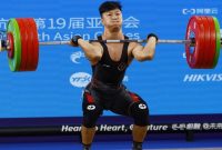 Rahmat Erwin Abdullah pecahkan rekor dunia dalam Kejuaraan Angkat Besi Asia 2025. (REUTERS)