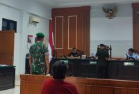 Sertu Riza Phalevi terdakwa kasus penganiayaan anak menjalani sidang dakwaan di Pengadilan Militer, Rabu (9/7).