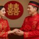 Pasangan pengantin Indonesia menikah dengan busana adat Tionghoa berdasarkan Feng Shui 2026