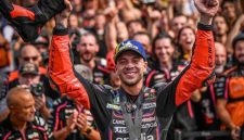 Pembalap Aprilia Racing Marco Bezzechi merayakan keberhasilannya memenangi sprint race MotoGP San Marino 2025 di Sirkuit Dunia Misano Marco Simoncelli, Italia, Sabtu (13/9/2025).