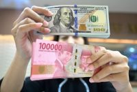 rupiah spot melemah 0,06% ditutup di level Rp 16.425 per dolar Amerika Serikat (AS) dari sehari sebelumnya yang ada di Rp 16.416 per dolar AS.