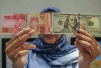 rupiah spot melemah tipis 0,02% dibanding penutupan hari sebelumnya yang berada di level Rp 16.425 per dolar AS.