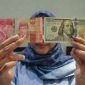 rupiah spot melemah tipis 0,02% dibanding penutupan hari sebelumnya yang berada di level Rp 16.425 per dolar AS.
