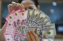 rupiah spot melemah 0,1% dibanding penutupan hari sebelumnya yang berada di level Rp 16.575 per dolar AS.rupiah di pasar spot masih bergerak tipis berada di level Rp 16.586 per dolar Amerika Serikat (AS).