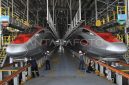 Teknisi dari Indonesia didampingi teknisi dari China melakukan perawatan Kereta Cepat Whoosh di Join Workshop Depo Tegalluar, Kabupaten Bandung, Jawa Barat, Senin (29/7/2024).Foto: ANTARA FOTO